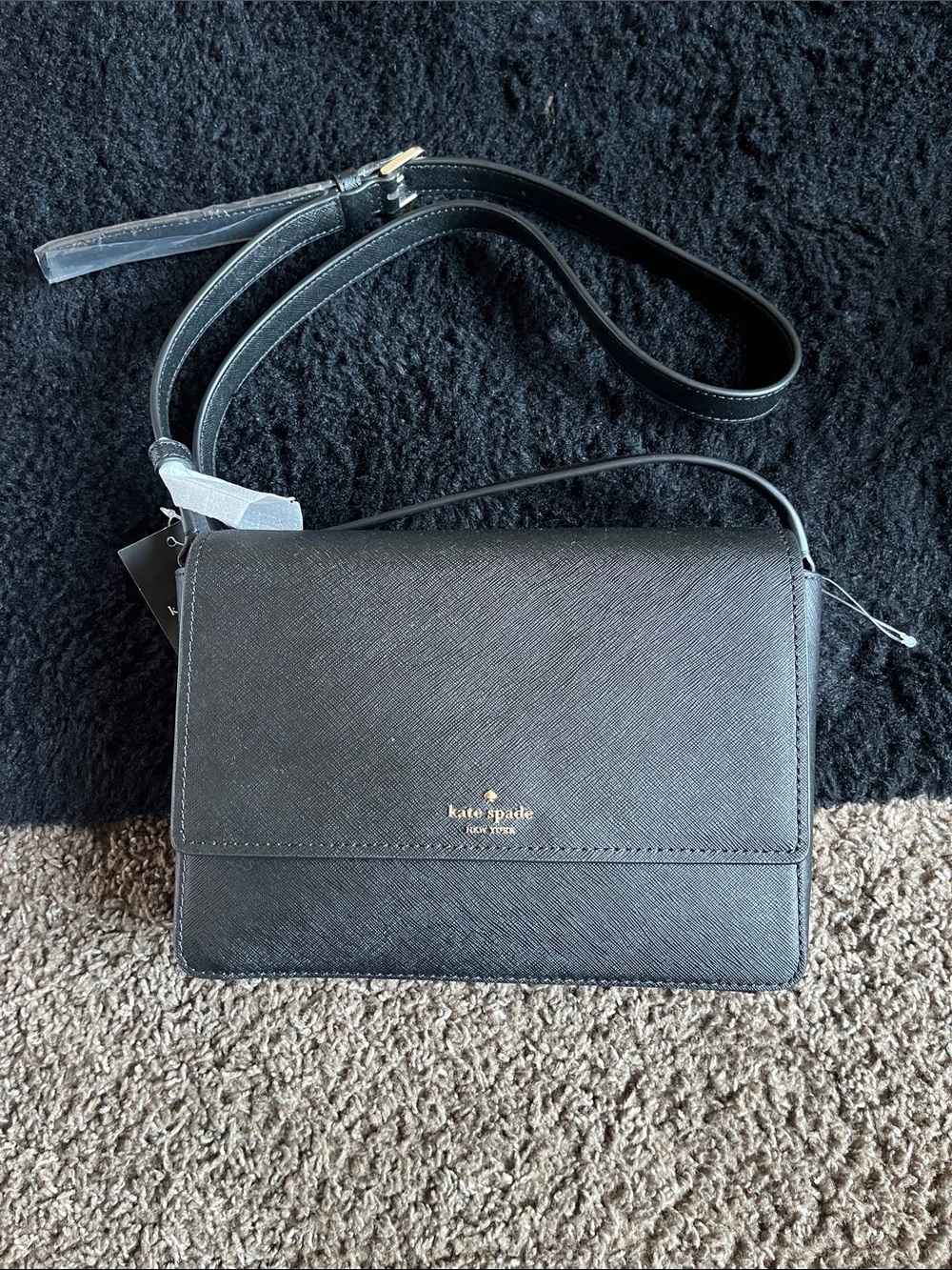 kate spade black Saffiano leather crossbody bag with gold logo